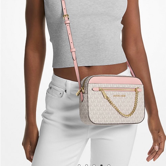 Michael Kors crossbody bag. The color is white with light pink - Picture 4 of 4